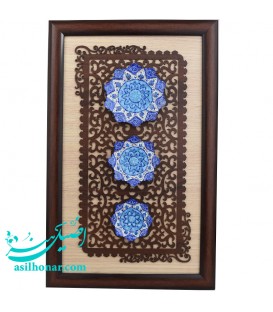 Tableau de trois assiettes en émail 